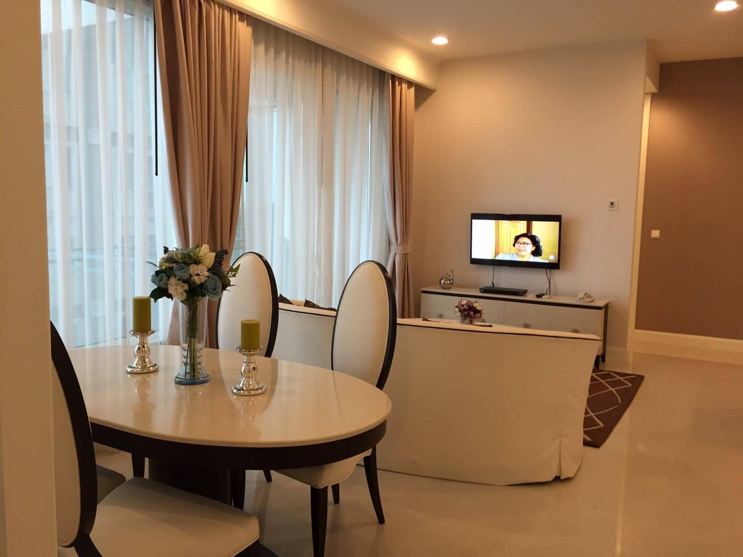 Q Langsuan, living room published with the listing