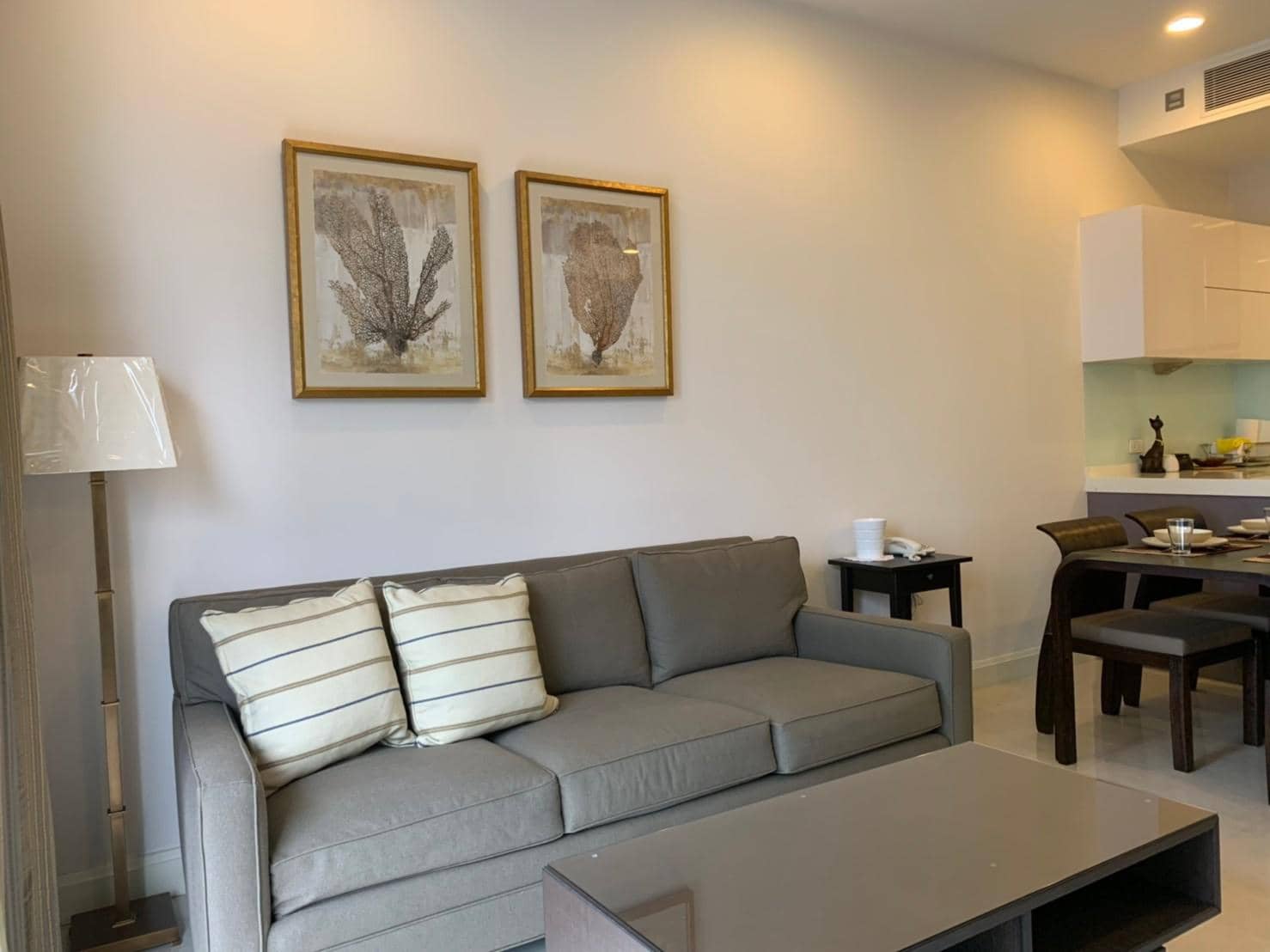 Q Langsuan, living room published with the listing