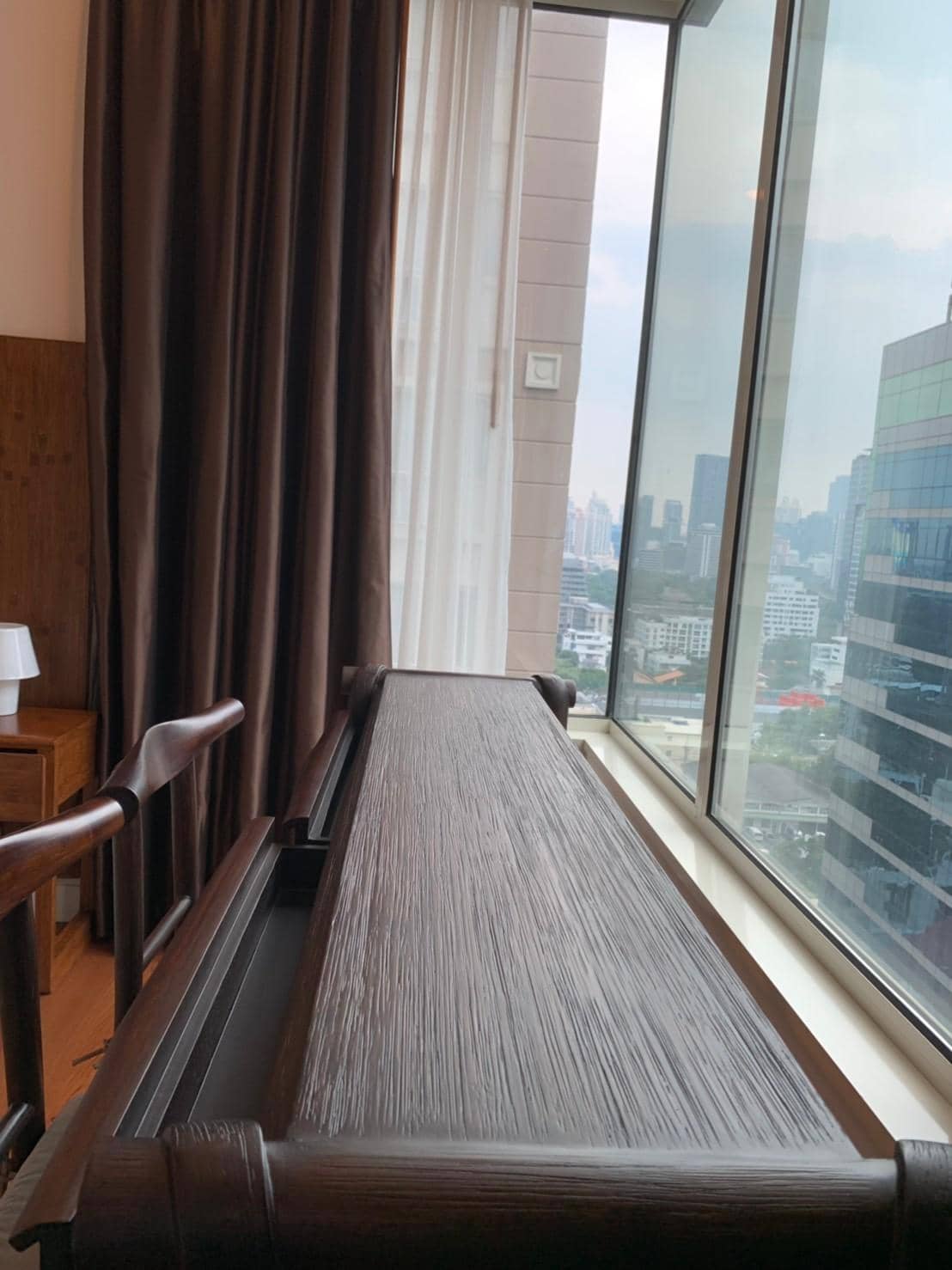 Q Langsuan, living room published with the listing
