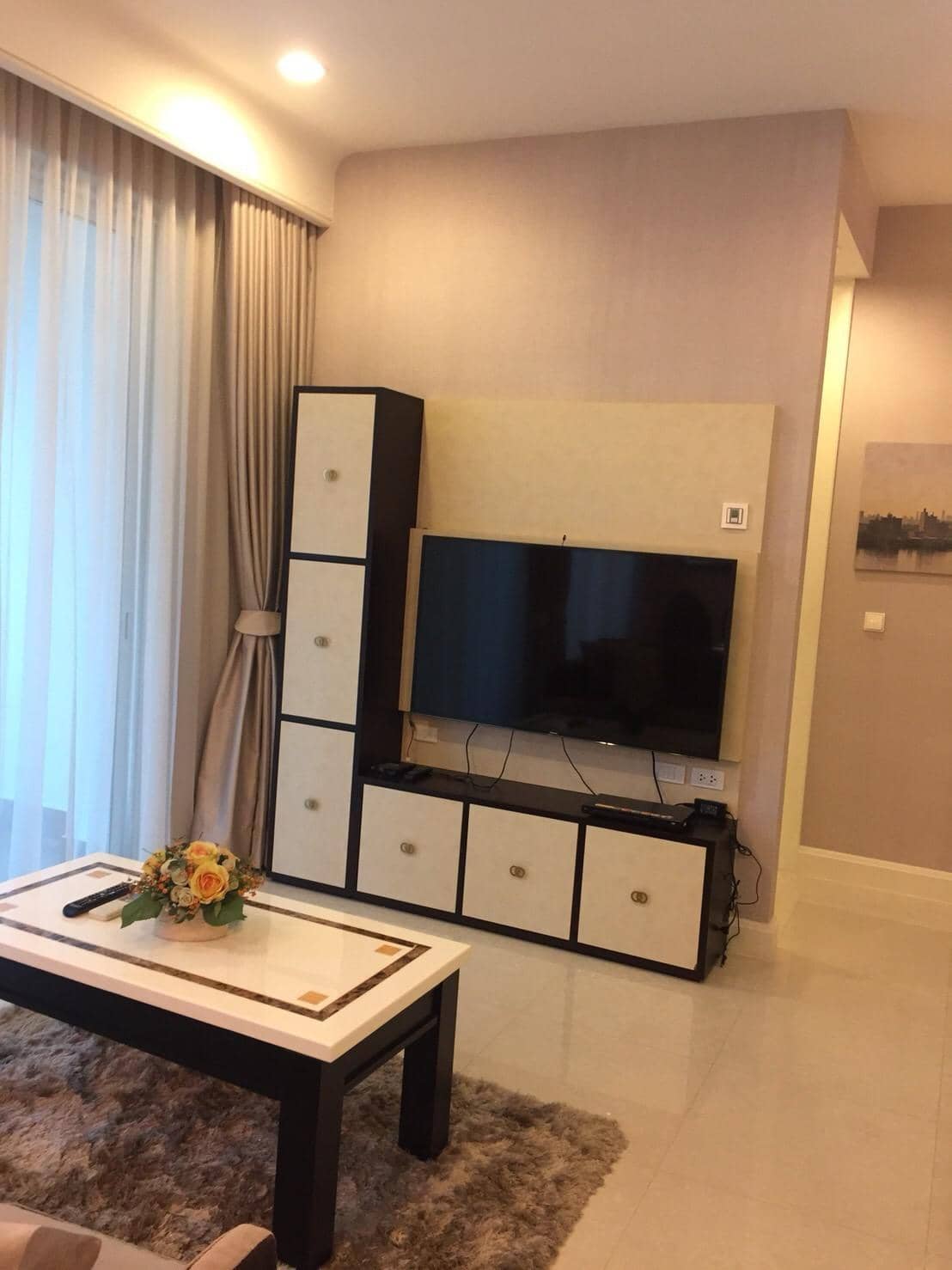 Q Langsuan, living room published with the listing