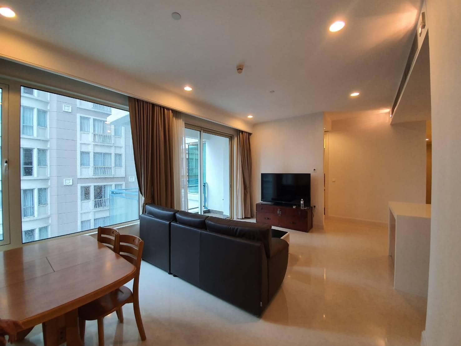 Q Langsuan, living room published with the listing