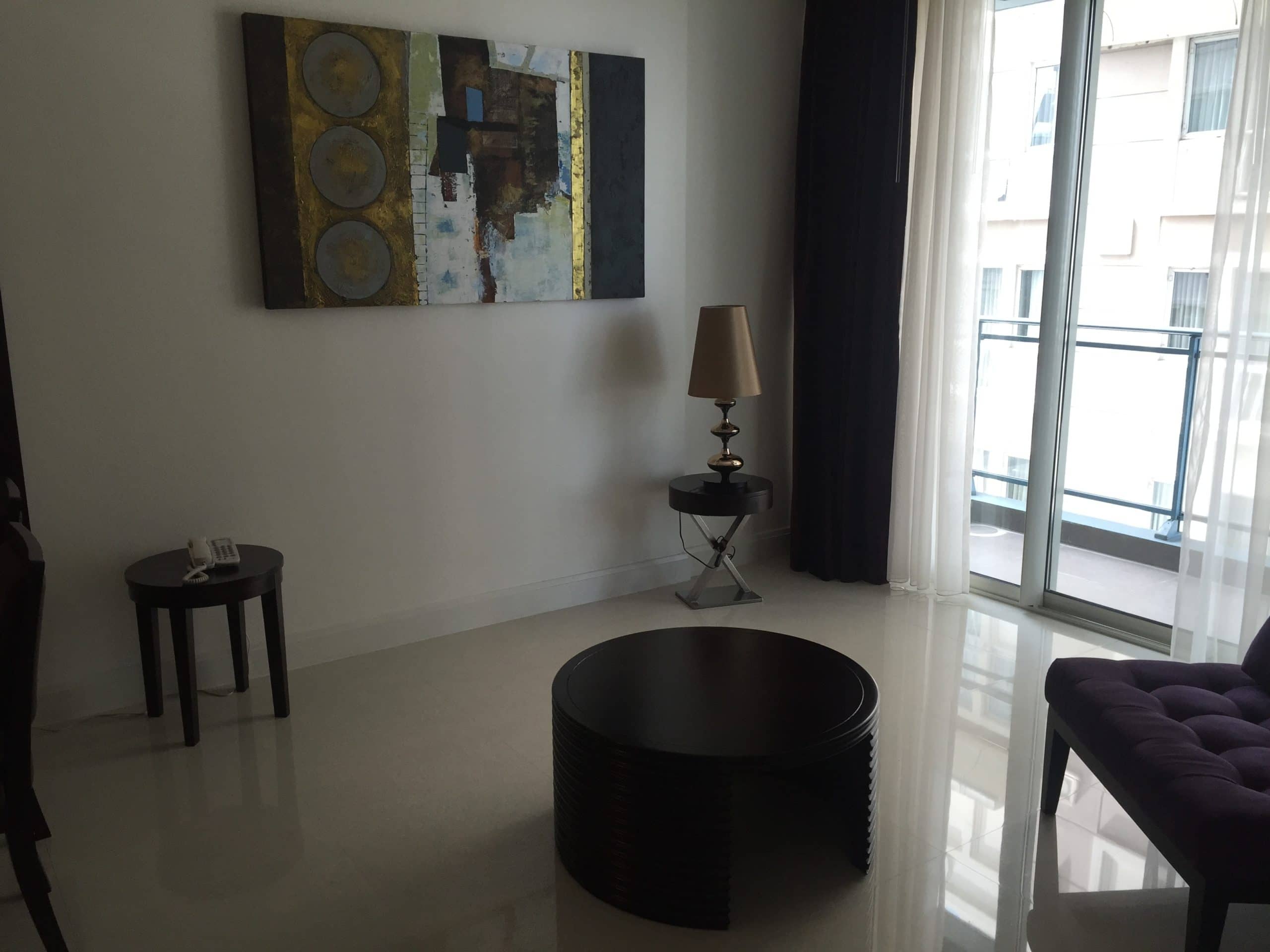 Q Langsuan, living room published with the listing