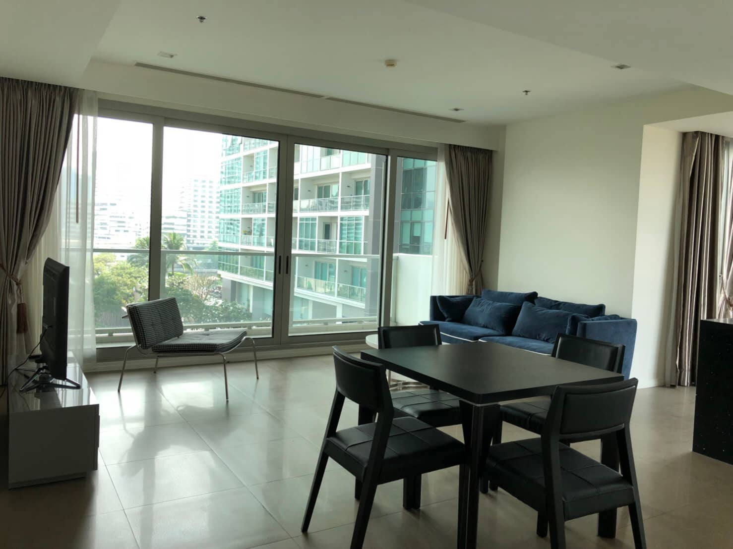 The River Condominium, living room published on the PropertyScout card
