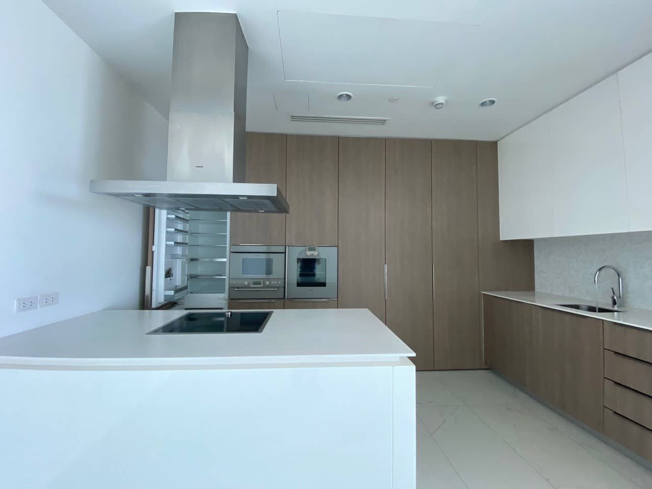 The Rajdamri, kitchen published with the listing