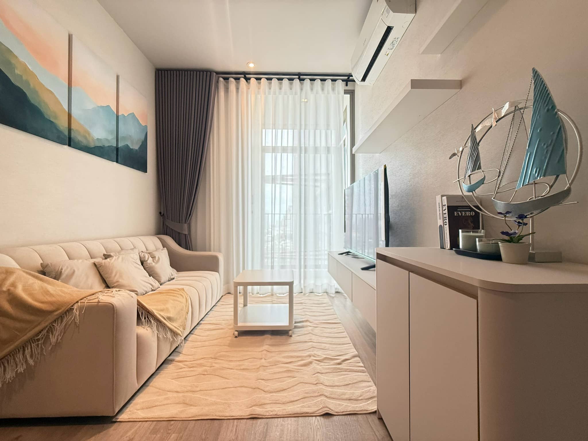 Rhythm Ekkamai Estate, living room published on the PropertyScout card