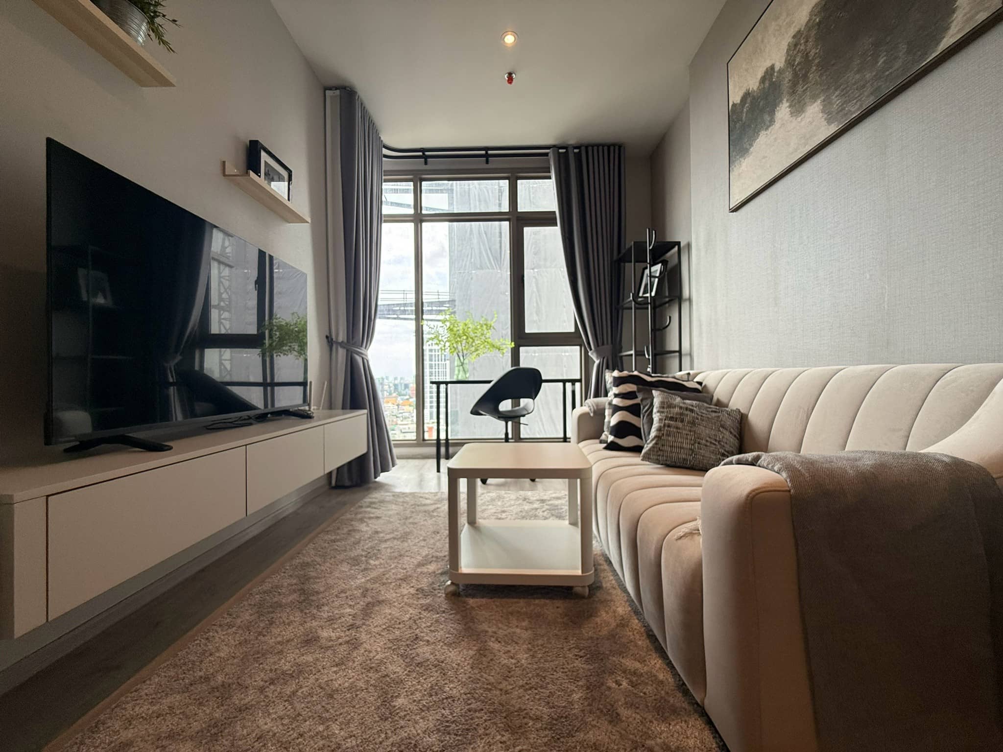 Rhythm Ekkamai Estate, living room published on the PropertyScout card