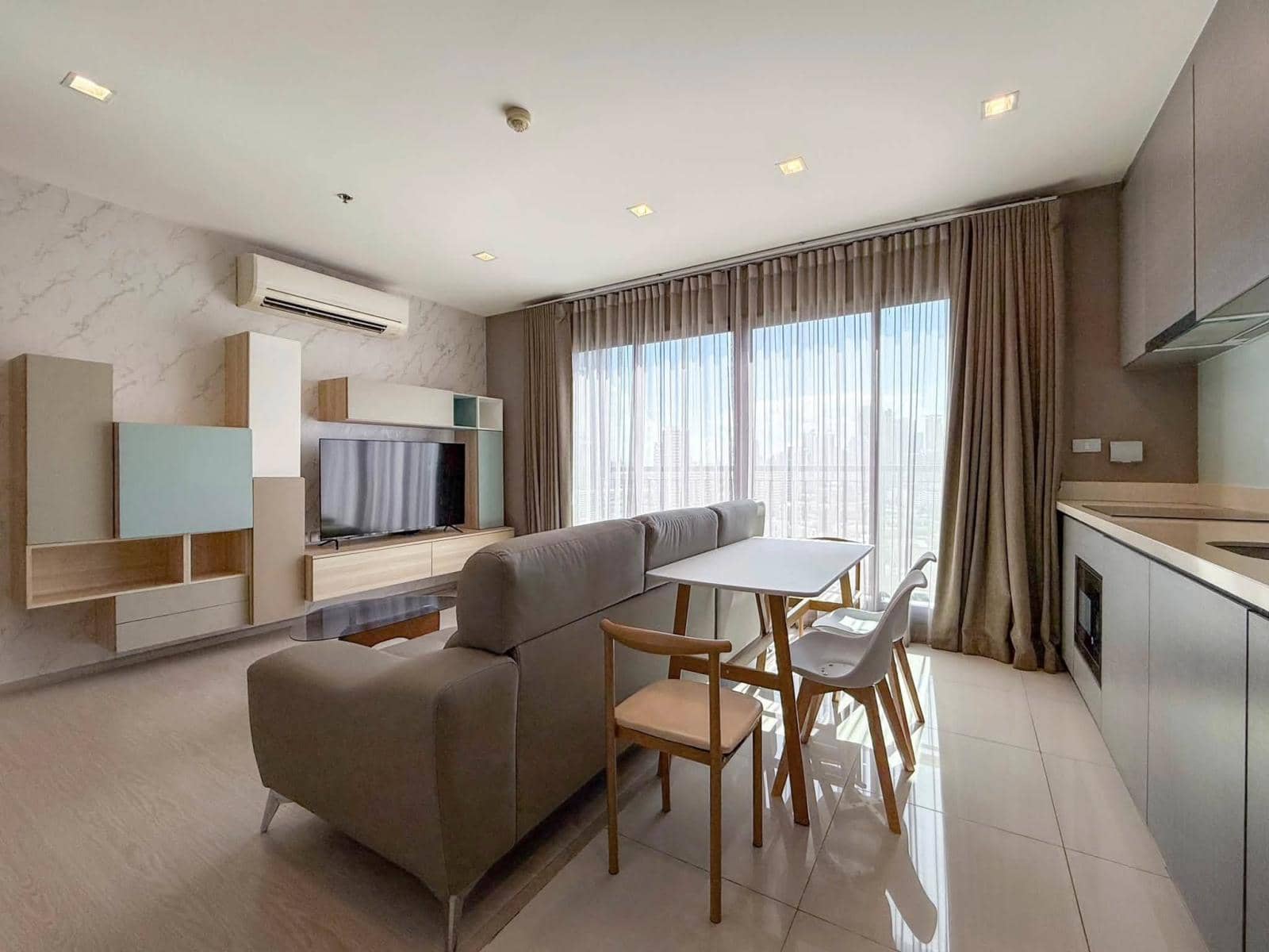 Rhythm Sukhumvit 36-38, living room published on the PropertyScout card